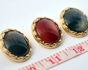 Gold buttons with a central pearl nuanced Red/ Gray/ Brown acrylic