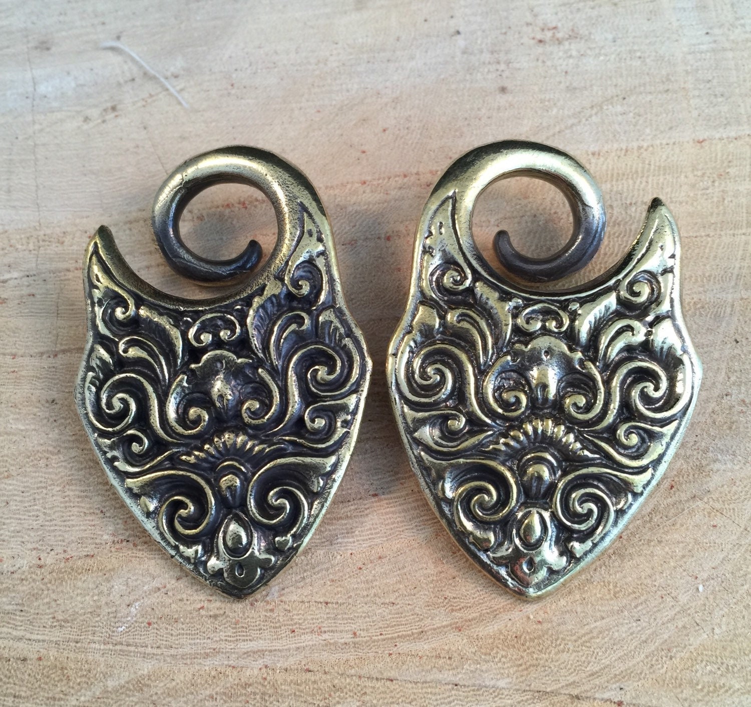 Brass shield ear weights for stretched ears