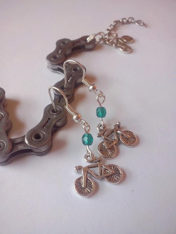 Items similar to Earrings bike swarovski purple green turquoise , bike