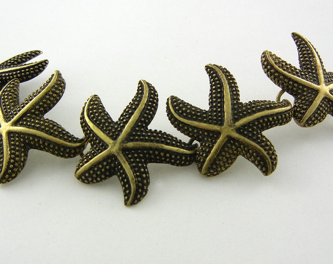 5 Burnished Gold-tone Starfish Charms Linked