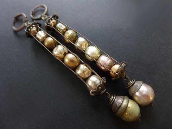Golden Moons. Caged baroque pearl earrings.