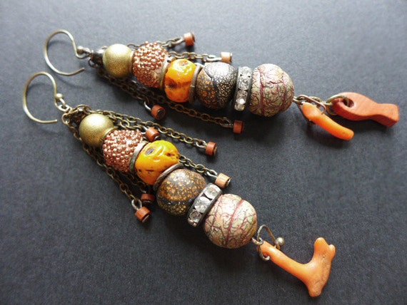 The Goal of Knowledge. Stacked earrings with rustic art beads. Victorian tribal assemblage. Orange, brown.