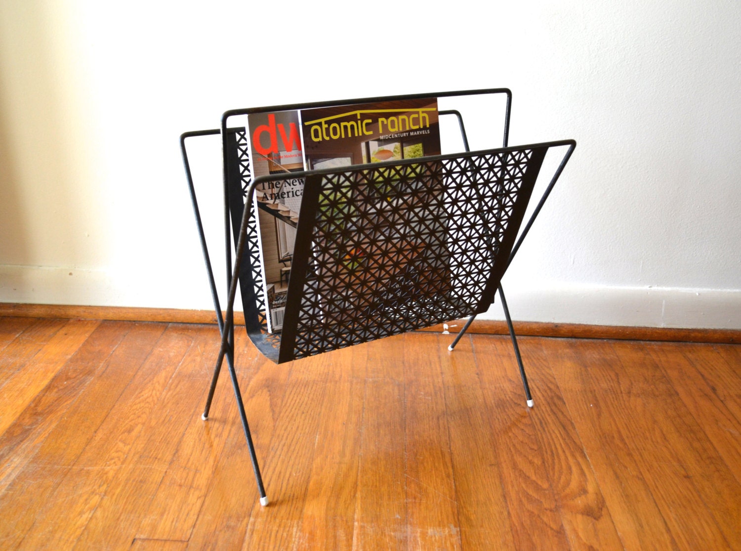 Mid Century Stamped Metal Magazine Rack