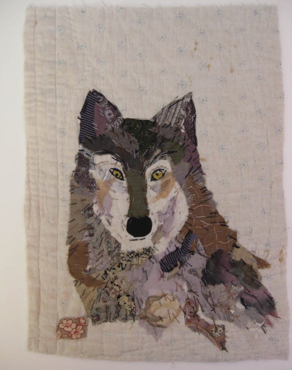 Wolf.Unframed appliqued and hand embroidered wolf on old