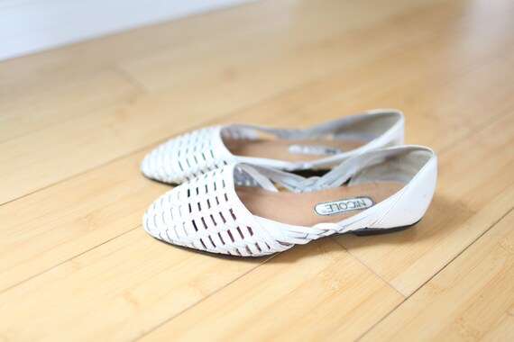white leather flats women