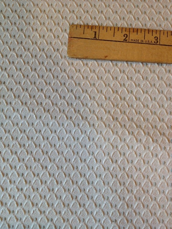 cream upholstery fabric with small gray accents woven design