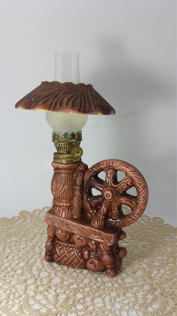 Vintage Ceramic Yawn Spinning wheel Oil Lamp by DeeSweetNostalgia