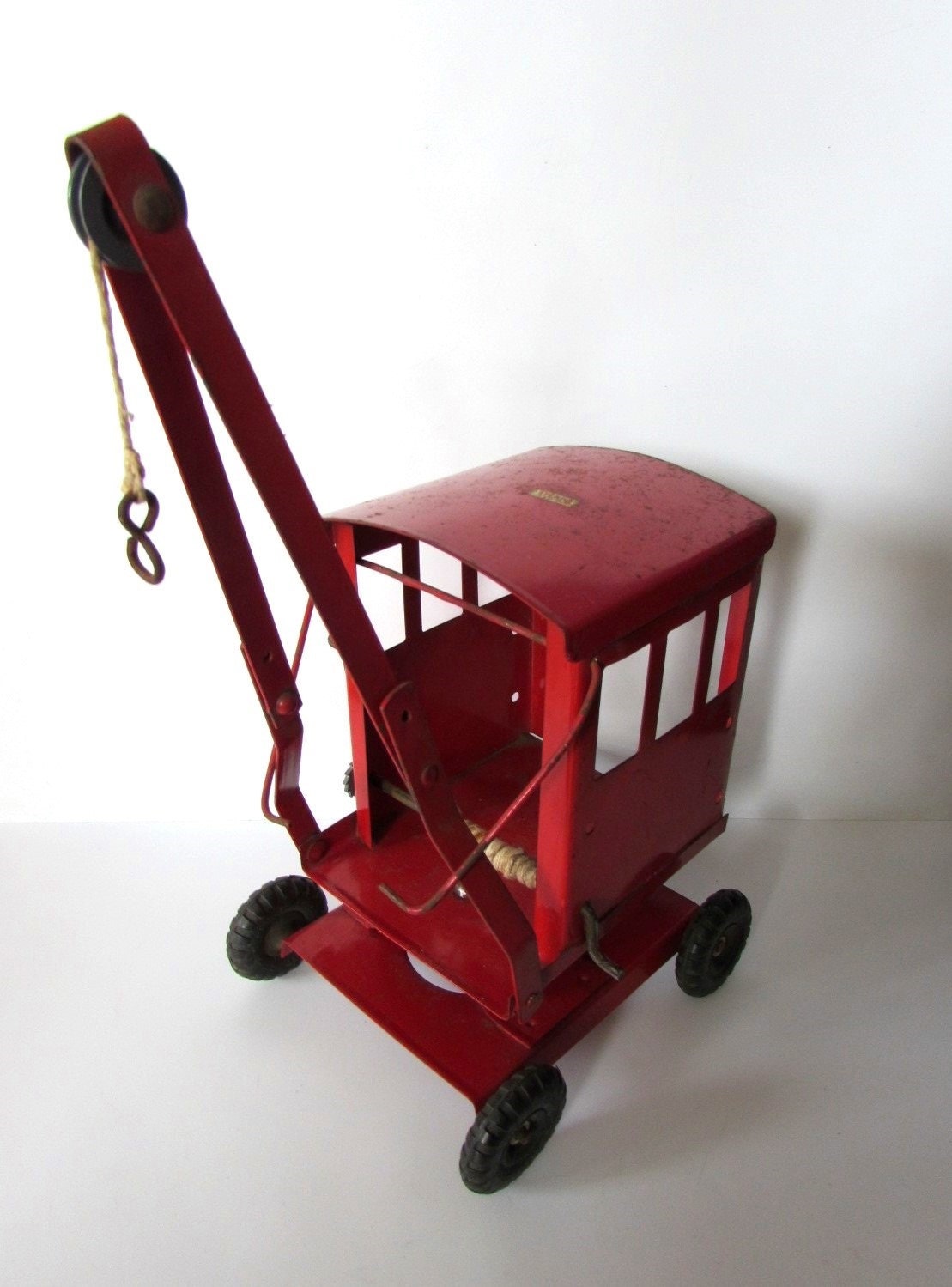 antique metal toy crane