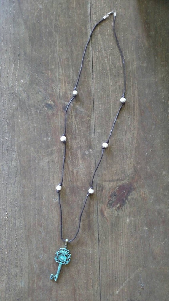 Items similar to Pearls and Key Necklace Long Necklace on Etsy