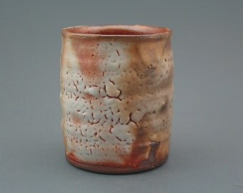 Cup, wood-fired stoneware w/ shino and natural ash glazes