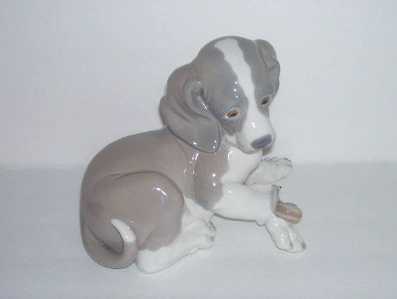 lladro dog and snail