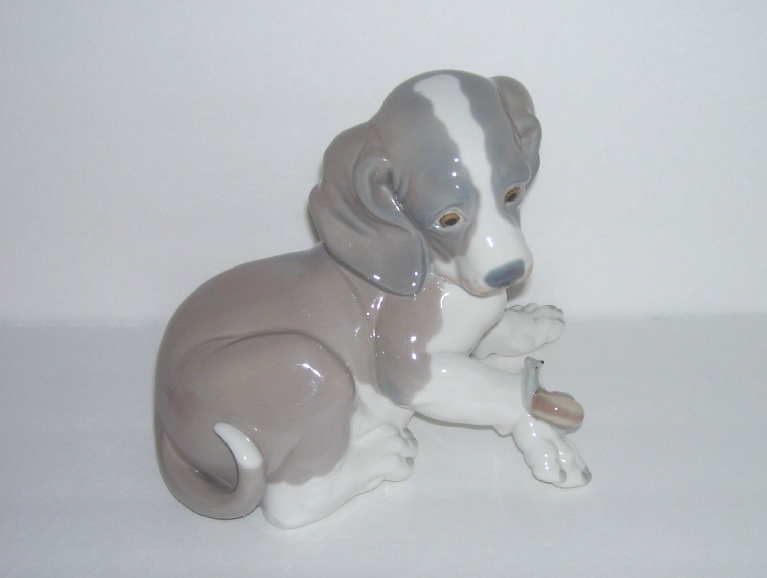 lladro dog and snail