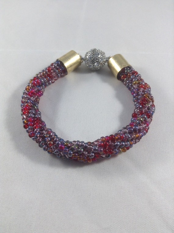 Red twisted herringbone bracelet by Lesannahsbracelets on Etsy