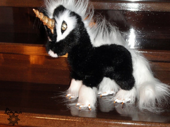 black unicorn plush toy