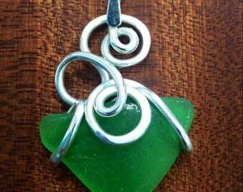 Items similar to Sea Glass Pale Sea Foam Pendant with Filigree Bell Cap