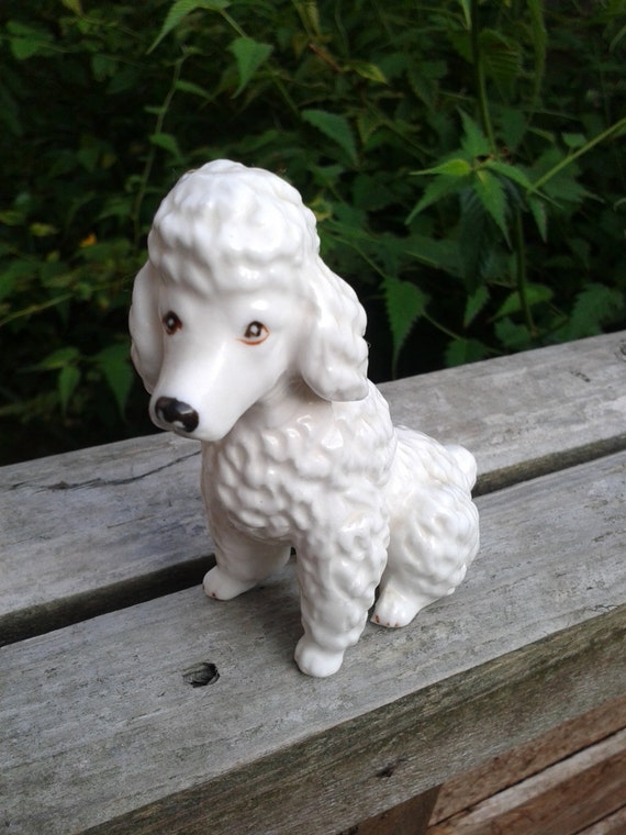 white ceramic poodle