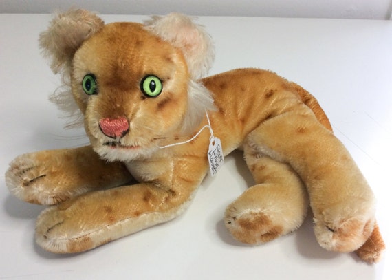 Items similar to Vintage STEIFF Small Lying Lion Cub 9