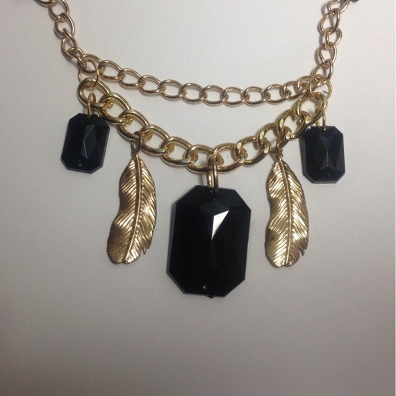 Items similar to Gold Feather Black Jewels Arm Band on Etsy