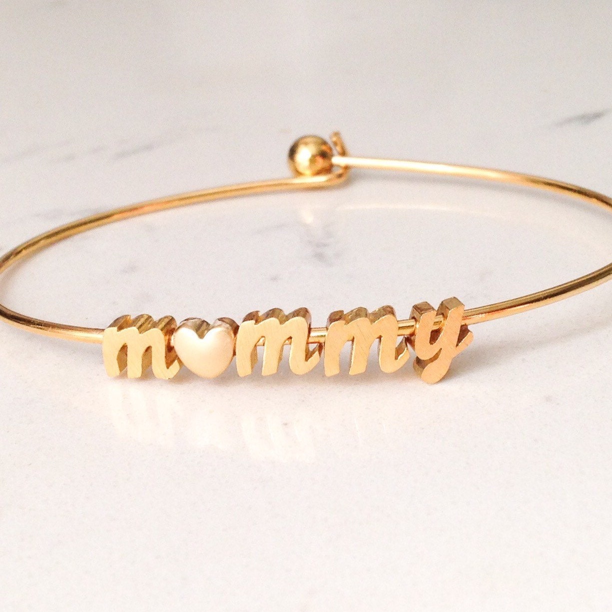 name bracelet // gold script font