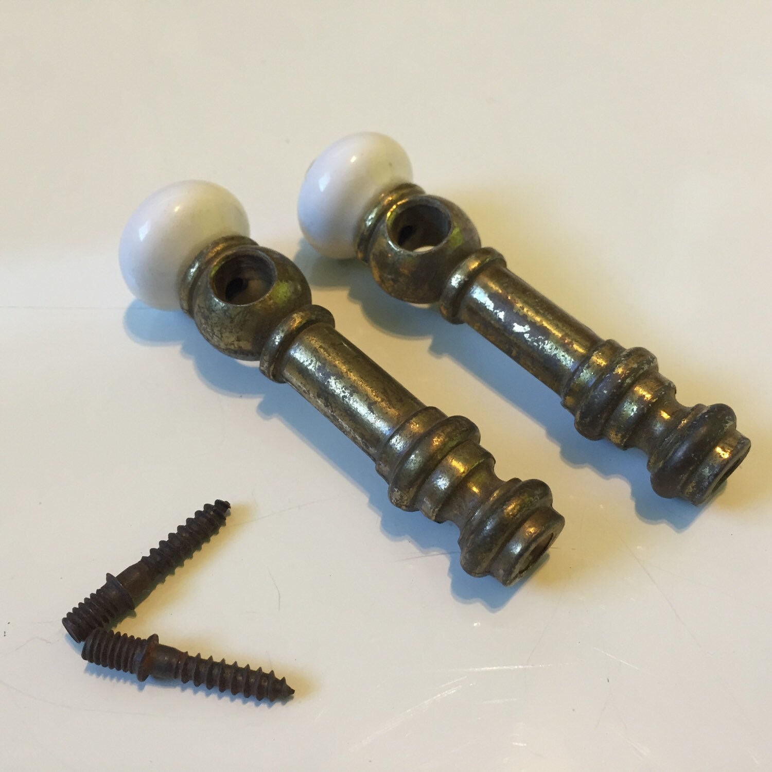 Vintage Pair of Antique Brass and Porcelain Shelf Furniture Hardware