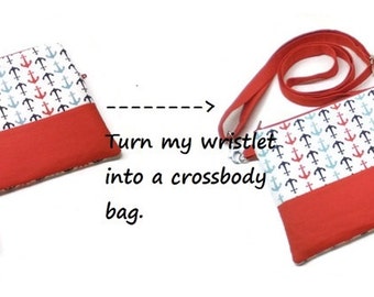 Turn my wristlet into a crossbody bag; add a shoulder strap to my wristlet.