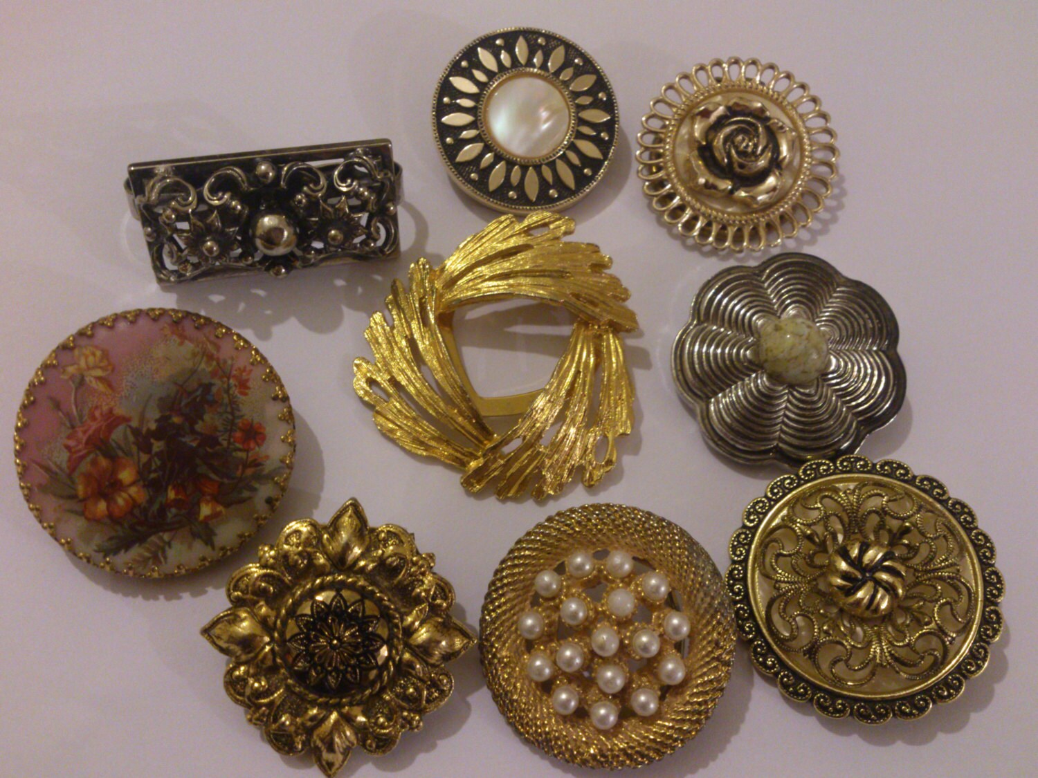 lot of nine vintage scarf clips