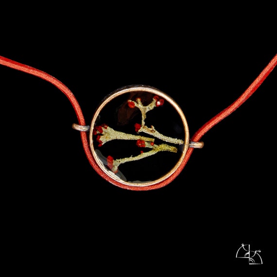 A little red. Estetic Jewelry Set. Elegant pendant and earrings in the Art Nouveau style. Black and red colors.