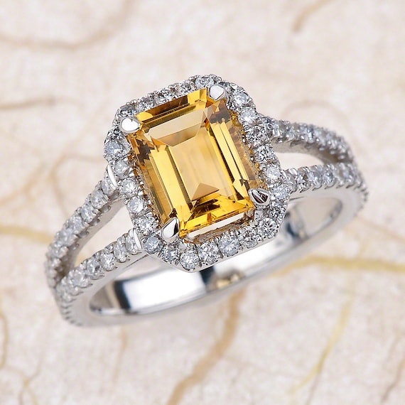 Yellow Topaz Engagement Ring - 14kt white gold diamond engagement ring .85 ctw G-VS2 quality diamonds Yellow Topaz Engagement Ring - 14kt white gold diamond engagement ring .85 ctw G-VS2 quality diamonds Yellow Topaz Engagement Ring - 14kt white gold diamond engagement ring .85 ctw G-VS2 quality diamonds Yellow Topaz Engagement Ring - 14kt white gold diamond engagement ring .85 ctw G-VS2 quality diamonds 🔎zoom Request a custom order and have something made just for you. Item details 5 out of 5 stars. (324) reviews Shipping & Policies Ladies 14kt white gold diamond engagement ring. The center is Natural 2.00ct yellow topaz. Total diamond weight on the ring is .85 carats of F/G color VS2 clarity round diamonds. For any reason u have any kind of question please contact us we will answer your questions and concerns promptly!! I’ve been Designing & Goldsmithing Diamond Engagement rings for over 28 years. This ring will come with a Certificate of Authenticity & Insurance Appraisal card from a GIA authorized gemologist, at no additional cost. I am also offering a FREE LIFETIME RESIZING & REPAIR as part of my warranty service. I don't believe in charging you to make this ring perfect in every way for you. You can contact me anytime after the sale to send the ring back to me for a FREE CLEANING, POLISHING & PRONG TIGHTENING SERVICE to ensure your ring is always in its best condition. With the ring: We also offer FREE ENGRAVING in most of our rings. The ring is complimented by a FREE JEWELRY RING BOX. -> Quality Assurance <- I stand behind everything I sell and warrant that all items will be free from any manufacturing defects at the time of delivery. In the event that there is ever a problem with your jewelry, it can be mailed back to our offices for inspection. If the problem is deemed to be from a manufacturing issue, we will repair or replace the item at no charge to you. For any kind of questions or queries PLEASE CONTACT ME, I will answer your questions and concerns promptly! ** Proudly Handmade in USA ** -> Order <- * This ring is made-to-order, please allow 5-7 business days for me to create your special ring. * This listing is for the 14k gold ring in a US ring size between 3-9. Sizes over size 9 are available. Please contact me for more details. -> Payment Plans <- I am very flexible with payment plans. It can be a weekly or monthly payment plan. contact me to set up a payment plan, please let me know: (1) How much would you like to pay for each payment (weekly or monthly). (2) Which date would you like to start the first payment. (3) Send me the link of the ring you would like to purchase and let me know the ring size. And I will set up the plan for you. Once the final payment is made, your ring will be shipped out. -> Shipping Details <- Every purchase from EJ COLLECTIONS comes with UPS shipping worldwide. Tracking details are provided the moment we dispatch your order so you can follow your package until it reaches your door. …………………………………………. *** Attention international shoppers (outside the USA) *** International shipments may be subjected to Customs fees, Duties and taxes separately calculated and collected at the time of delivery which must be paid and handled by customer to insure delivery. Each country has its own rules and regulations so I am not able to provide any advice. Customs processes, import duties and sales taxes are the responsibility of the customer. Please check with your local customs office for information if you should have any concerns. Thank you. …………………………………………….. Return to my Etsy shop http://www.etsy.com/shop/EJCollections Meet the owner of EJCOLLECTIONS Learn more about the shop and process John Eprem Yellow Topaz Engagement Ring - 14kt white gold diamond engagement ring .85 ctw G-VS2 quality diamonds
