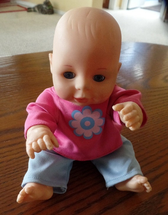  10” tall rubber baby doll