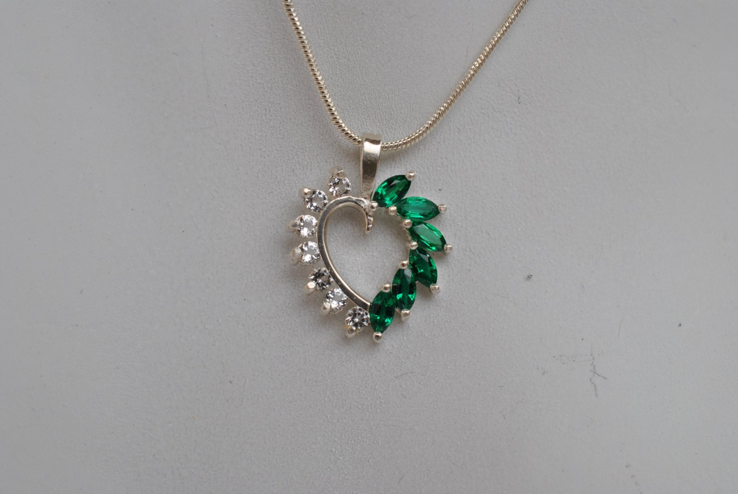 Lab Created Emerald Heart Pendant with Cubic Zirconia Accents.