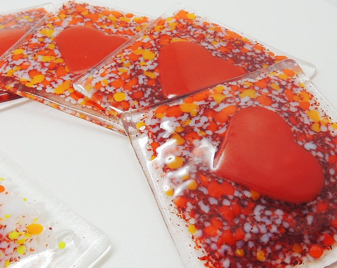 Red glass heart coasters. Handcrafted fused glass tiles. Gifts for the home. Housewarming wedding anniversary, birthday, leaving gifts.