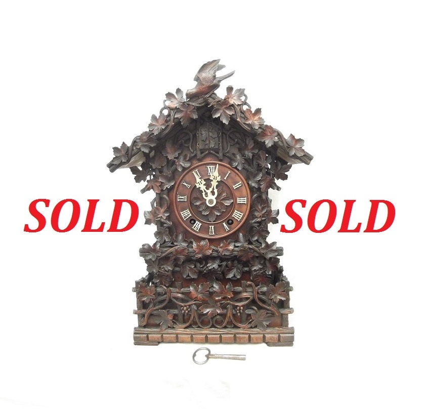 Antique, rare, impressive VERY ornate Black forest carved table cuckoo