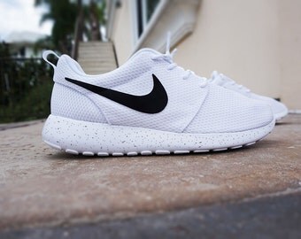 white roshes with black swoosh