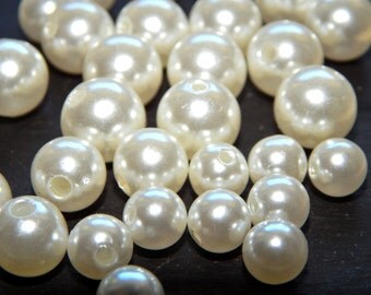 Lot of 10 beads of pearl ivory 6/8/10 mm
