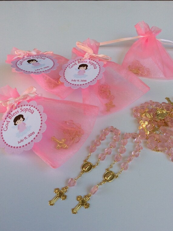 24 organza bags with mini rosaries included and thank you