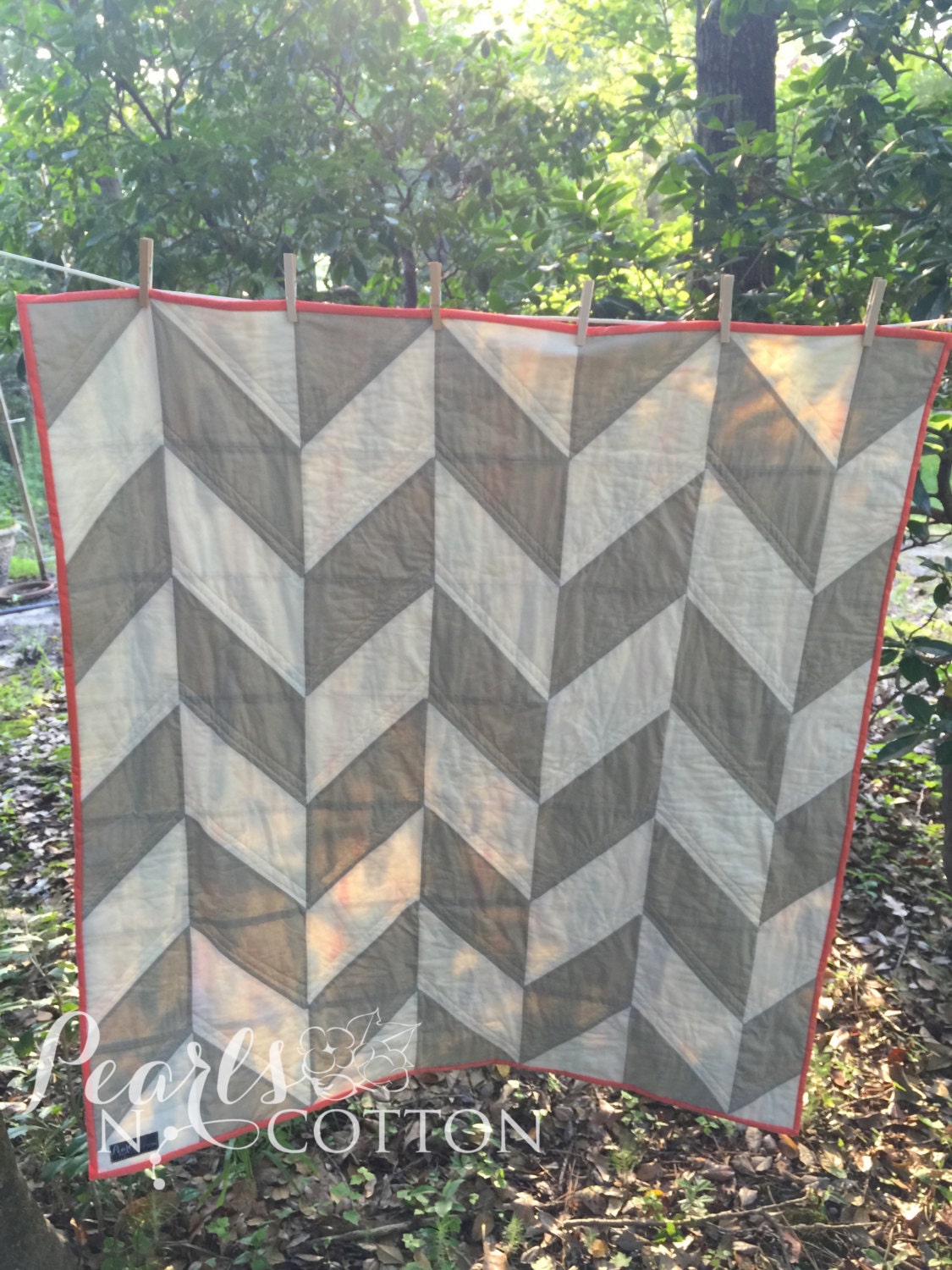 herringbone-quilt-grey-and-white-with-feather-backing-and