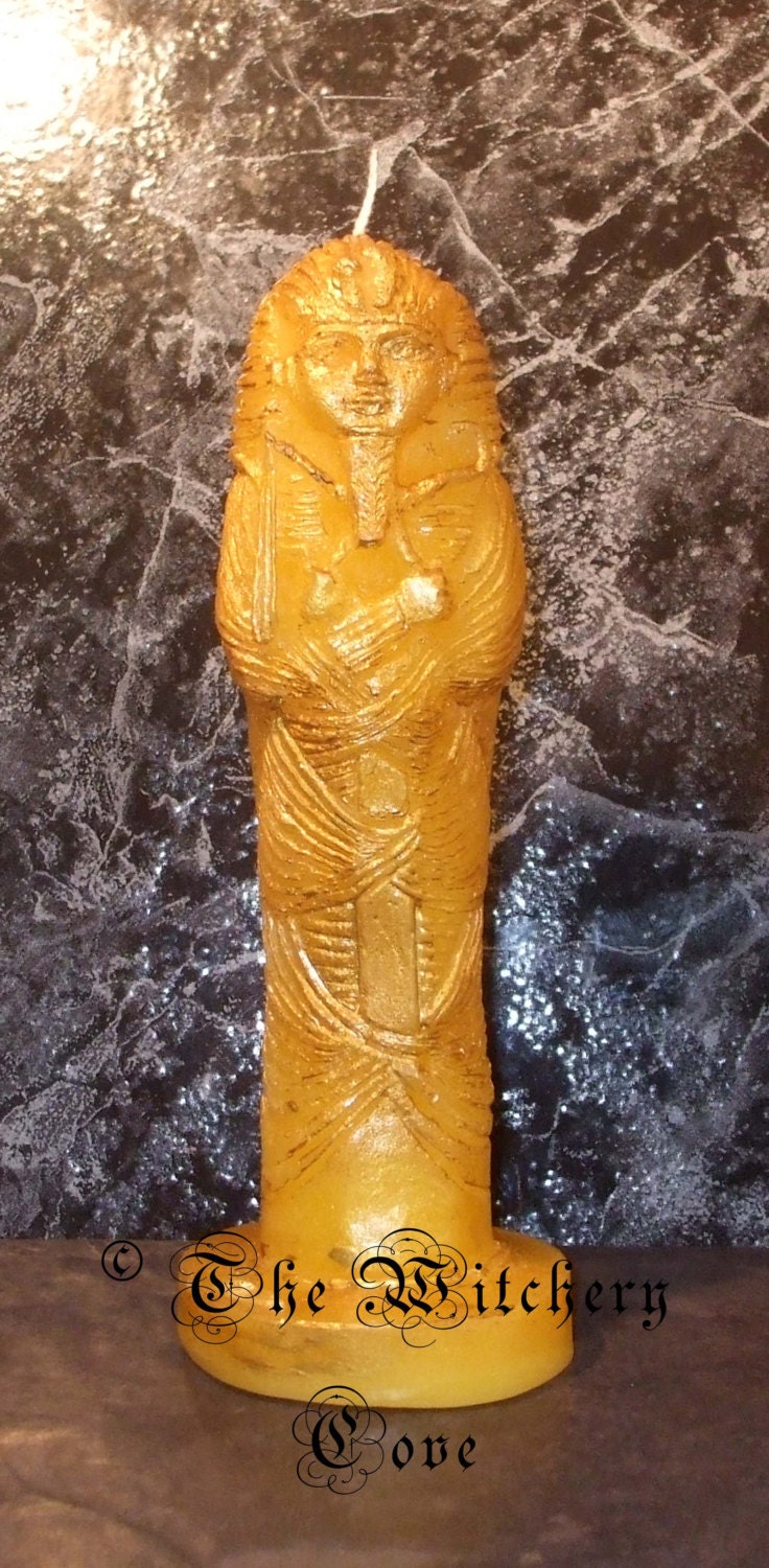 Egyptian Mummy Candle yellow throughout with golden highlights