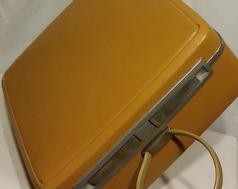 This adorable midcentury piece of luggage, was called The Carrier. The most utilized piece of luggage ever used in the US.