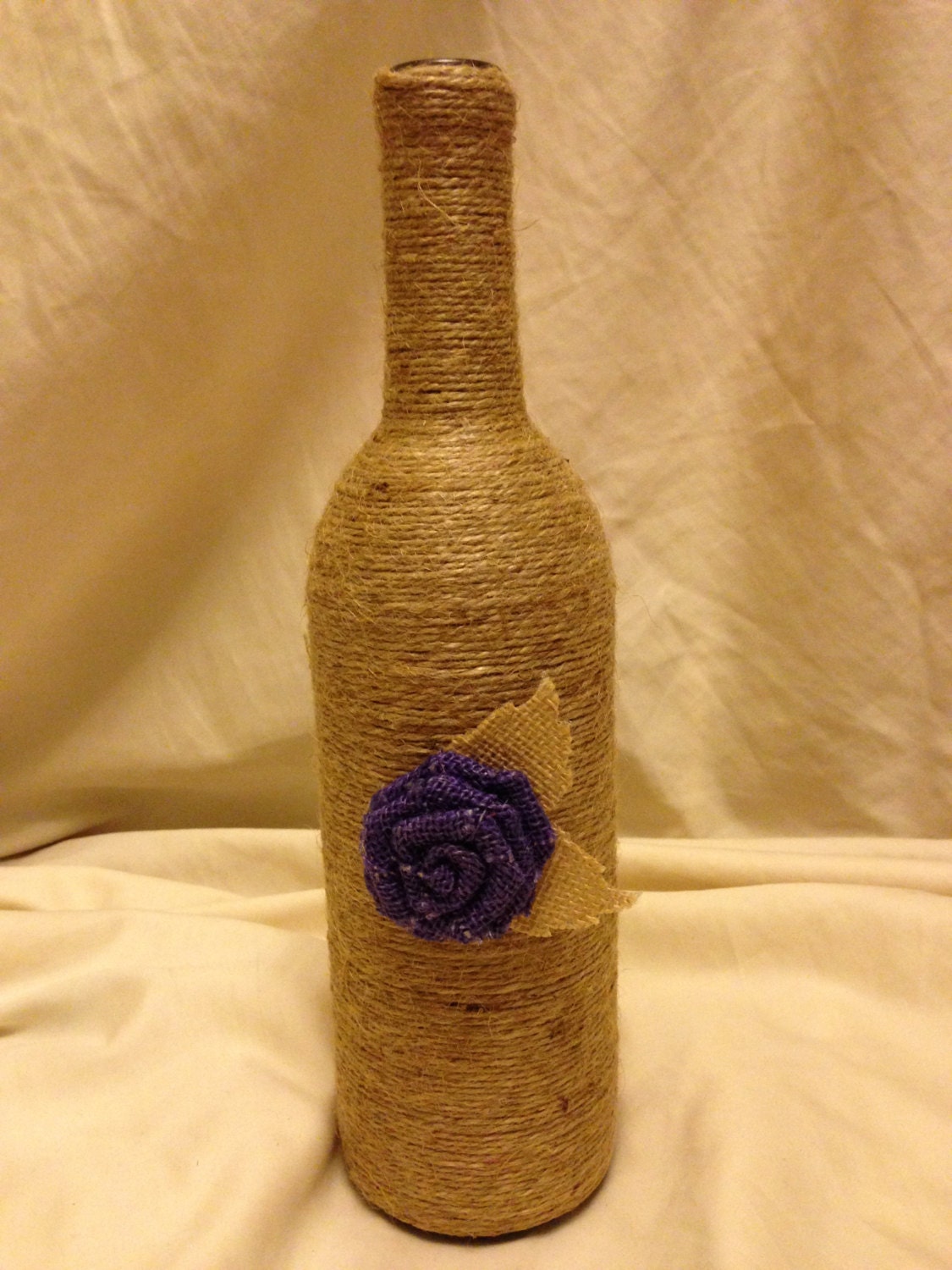 Twine Wrapped Wine Bottle w/ Purple Burlap Flower