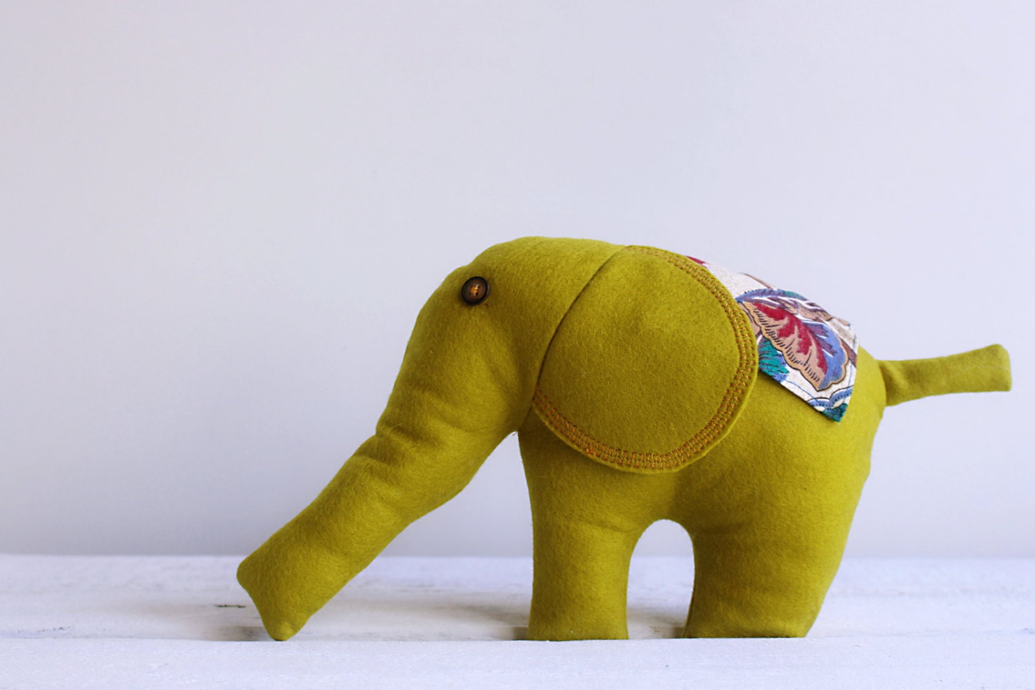 green stuffed elephant