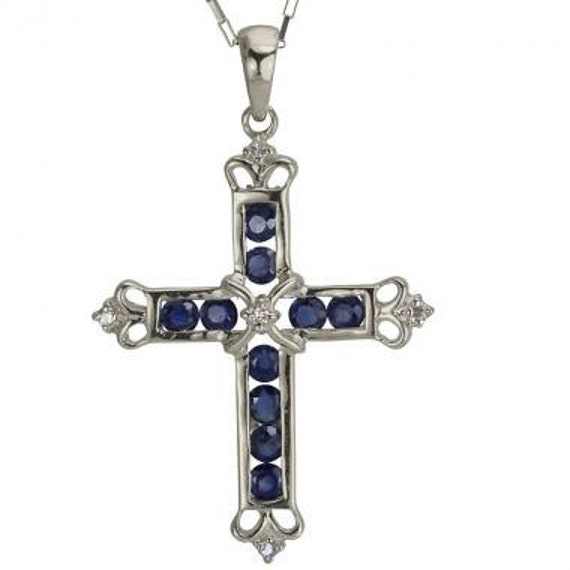 Gold Cross Necklace In 14k White Gold Featuring Blue Sapphires