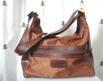 Llevar Vintage American Tourister en cruz bolsa de plástico, dos tonos marrón neutro, equipaje, maleta