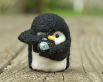 Needle Felted Penguin - Holding Camera