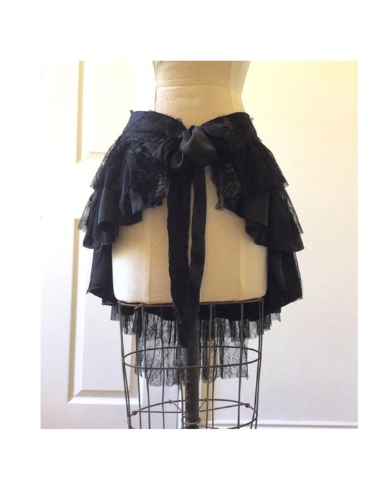 Black lace layered bustle skirt.