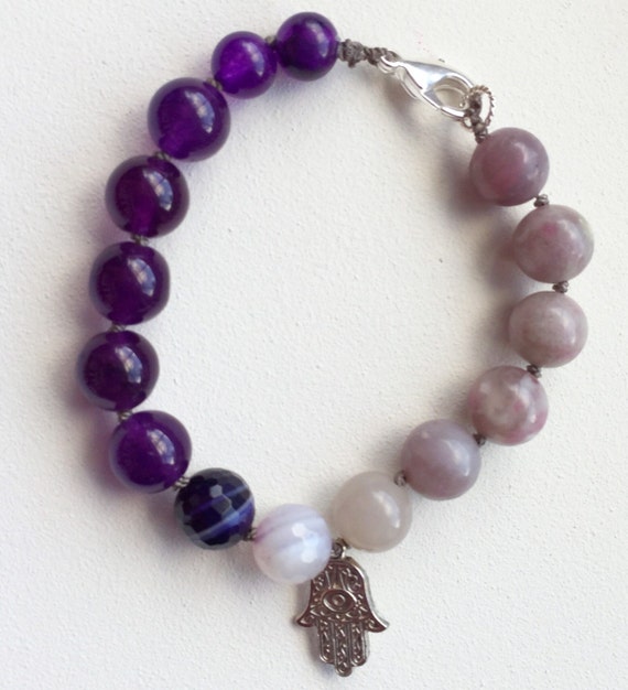 Items similar to Amethyst Hamsa Bracelet on Etsy
