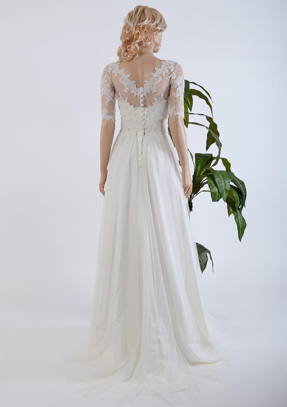Strapless lace wedding dress with boat neck elbow sleeve lace