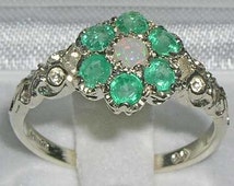 Opal and emerald engagement rings