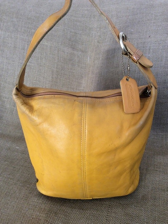 yellow coach shoulder bag