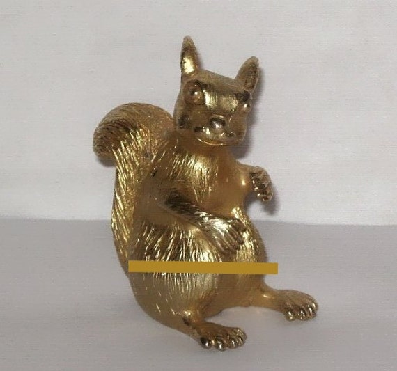 gold squirrel figurine