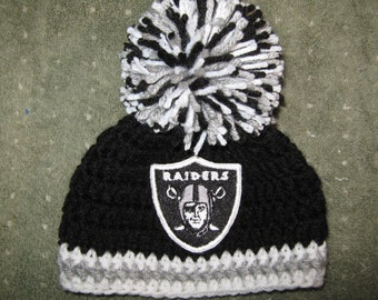 Crochet Beanie Baby Hat (Oakland Raiders colors) Embroidered Logo - Black, Gray and White with Raiders logo and large pom pom